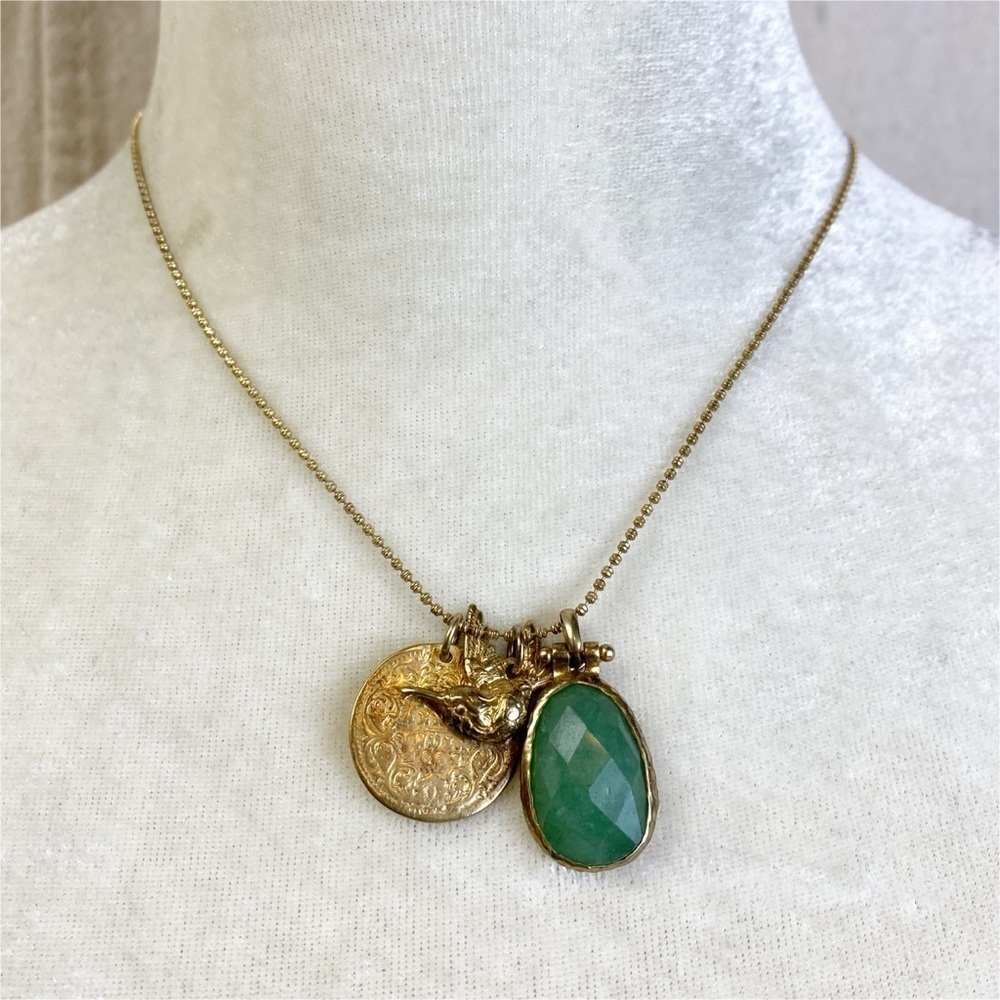 Stella & Dot Gold tone charm necklace coin bird green stone